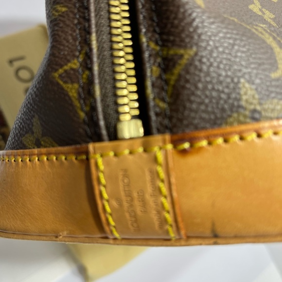 Loui Vuitton Alma in Monogram, with dust bag. - Picture 7 of 16